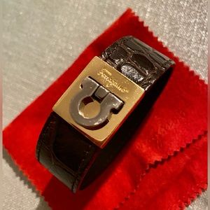 FERRAGAMO leather and silver/gold Gancini clasp cuff bracelet.